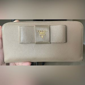 PRADA beige wallet with card authenticity.💖
